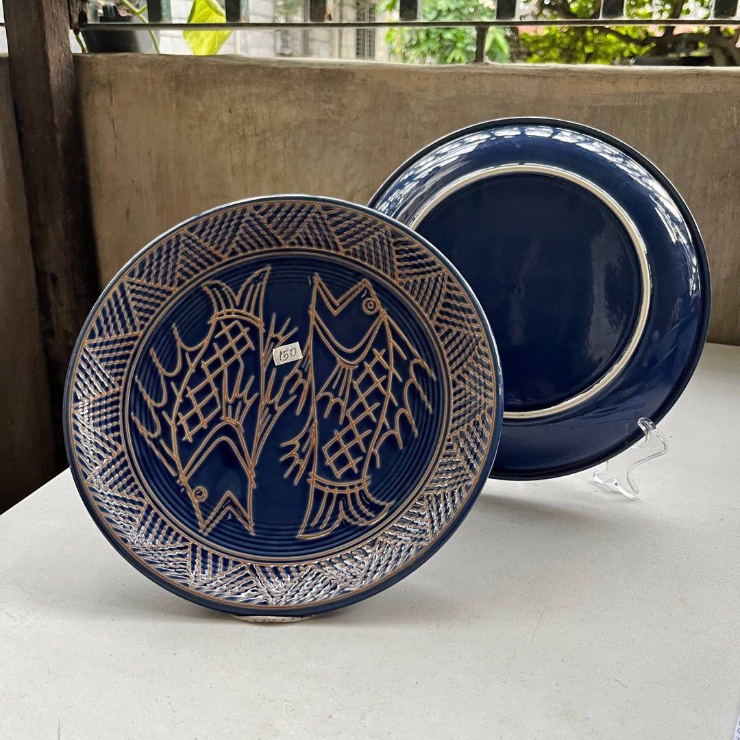 Ceramic Fish Design Plate (Category: Dinnerware & Cutlery) located in Manila. Submitted by juncobre_25 (Listing ID 1422803145, Image 2). Description: - Ceramic plate with fish design - Deep blue color - Round shape - Slightly raised edge - Decorative piece.