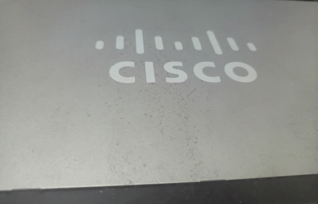 Cisco SG92-24 24-Port Gigabit Switch⁹ (Category: Networking) located in Manila. Submitted by ipstuff23 (Listing ID 1422844517, Image 2). Description: Cisco SG92-24 24-Port Gigabit Switch. Features 24 ports for network connectivity. The switch is a Cisco Small Business product. Model number is SG92-24. It has a power indicator and link/gigabit activity lights. The device is designed for network management and data transfer..