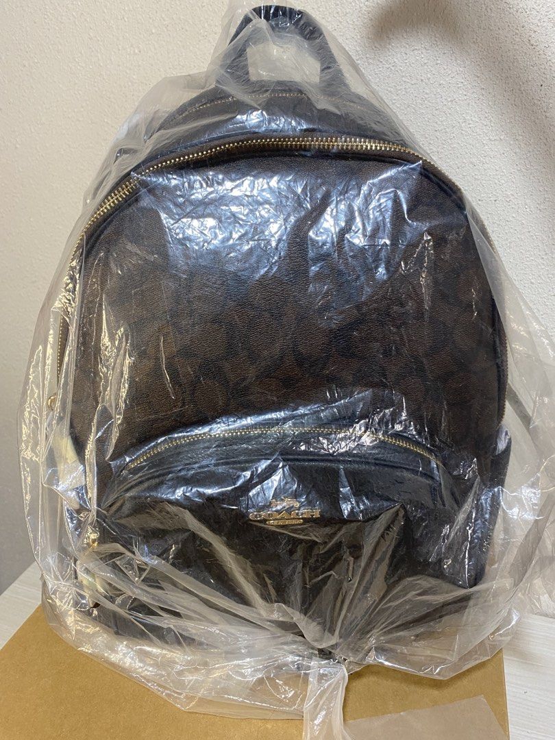 Coach Large Court Backpack (Category: Luxury Bags & Wallets) located in Caloocan City. Submitted by queenveeglamours (Listing ID 1422844960, Image 2). Description: - Large size backpack - Signature canvass in brown color - Elegant gold-tone hardware -Padded back support -Open to layaway ( up to 3 months) -30% Down Payment only .