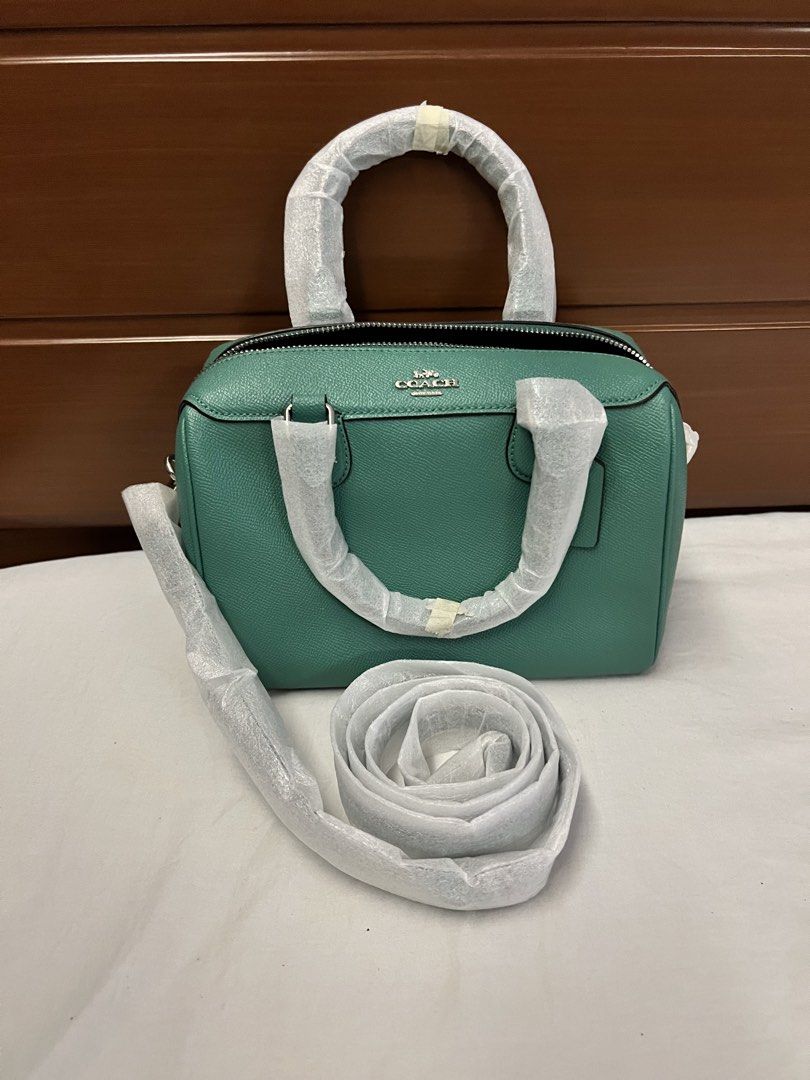 Coach Mini Bennett Satchel Handbag Turquiose (Category: Luxury Bags & Wallets) located in Quezon City. Submitted by spontaneousgrace (Listing ID 1422813491, Image 1). Description: AUTHENTIC COACH Crossgrain Leather Mini Bennett Satchel Turuoise * Crossgrain leather * Inside zip and multifunction pockets * Zip-top closure, fabric lining * Handles with 4” drop * Detachable strap with 23” drop for shoulder or crossbody wear * Dimensions: 9” (L) x 6 