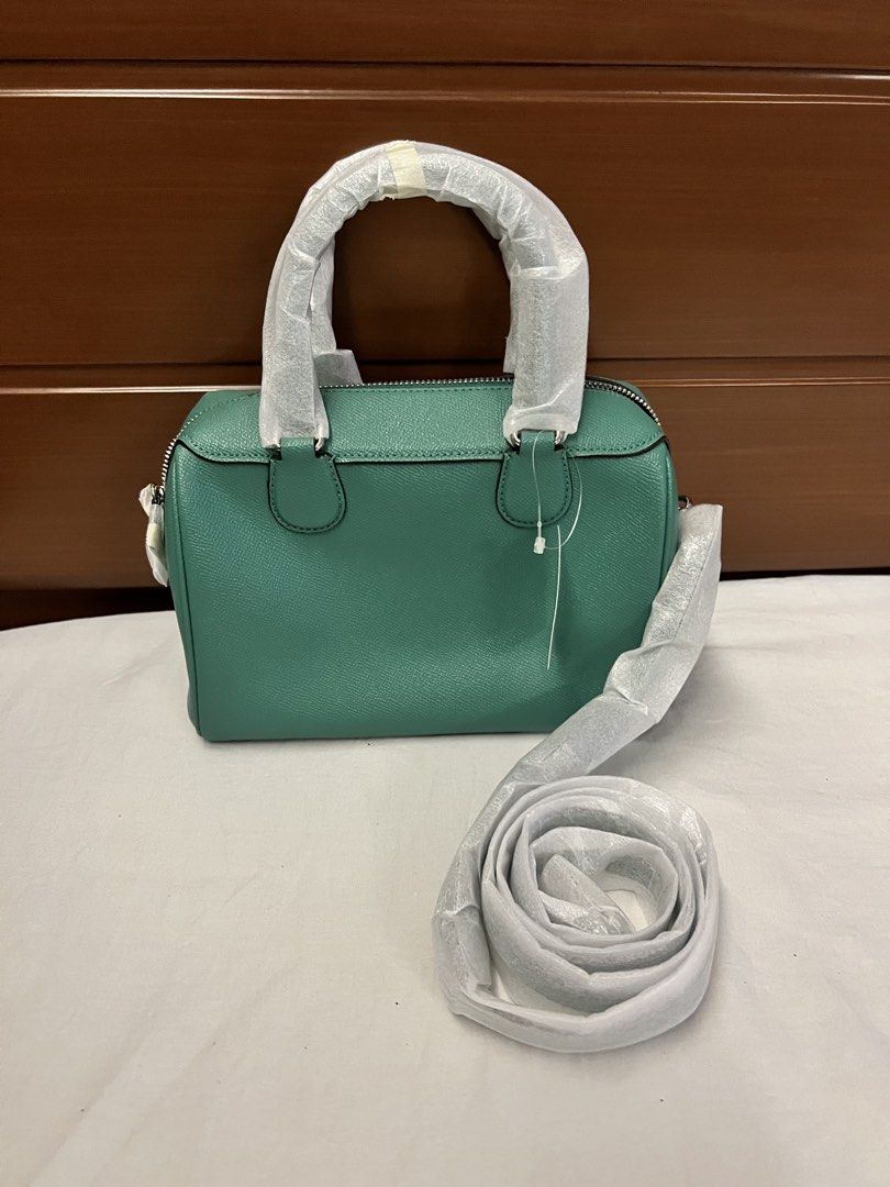 Coach Mini Bennett Satchel Handbag Turquiose (Category: Luxury Bags & Wallets) located in Quezon City. Submitted by spontaneousgrace (Listing ID 1422813491, Image 2). Description: AUTHENTIC COACH Crossgrain Leather Mini Bennett Satchel Turuoise * Crossgrain leather * Inside zip and multifunction pockets * Zip-top closure, fabric lining * Handles with 4” drop * Detachable strap with 23” drop for shoulder or crossbody wear * Dimensions: 9” (L) x 6 