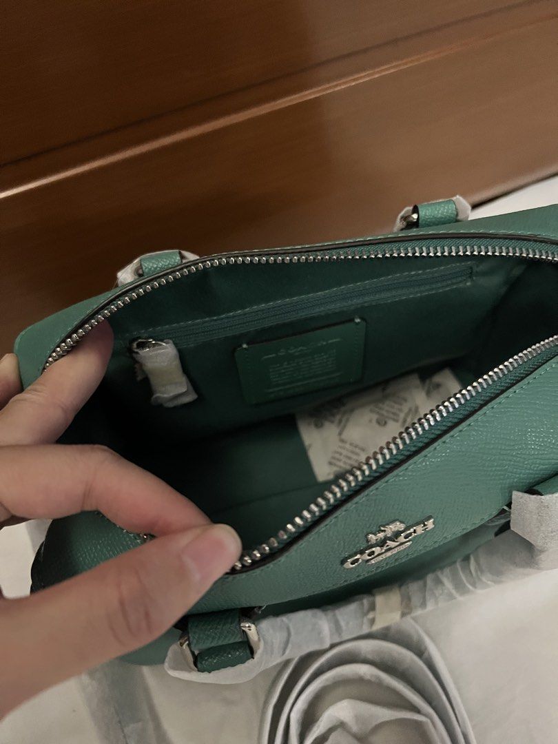 Coach Mini Bennett Satchel Handbag Turquiose (Category: Luxury Bags & Wallets) located in Quezon City. Submitted by spontaneousgrace (Listing ID 1422813491, Image 3). Description: AUTHENTIC COACH Crossgrain Leather Mini Bennett Satchel Turuoise * Crossgrain leather * Inside zip and multifunction pockets * Zip-top closure, fabric lining * Handles with 4” drop * Detachable strap with 23” drop for shoulder or crossbody wear * Dimensions: 9” (L) x 6 