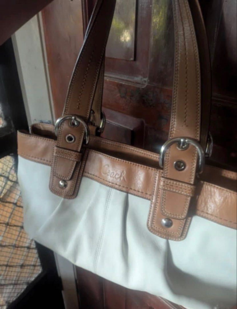 Coach Pleated Soho Tote Bag (Category: Luxury Bags & Wallets) located in Manila. Submitted by niniip (Listing ID 1422868156, Image 3). Description: -Authentic Coach Soho Pleated Tote -Need Wash may stain -Decluttering -One of my fave bags •Dimensions: Approximately 14”-18” (L) × 11” (H) × 4”-5.5” (D). • Interior Features: Typically includes a three-compartment design with a large central zippered divider, an additional interior zip pocket, and tw