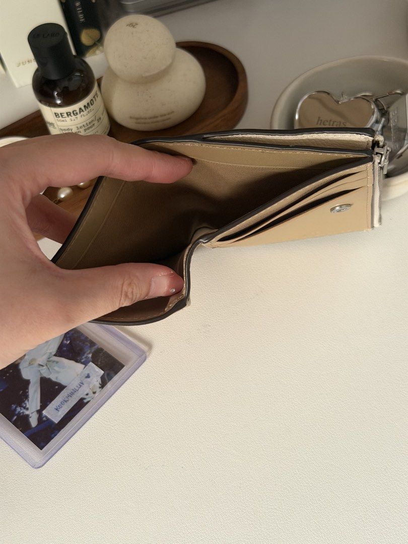 Coach Slim Bifold Wallet (Category: Luxury Bags & Wallets) located in Quezon City. Submitted by kookminluv (Listing ID 1422717709, Image 3). Description: 🤍 Very slim bifold wallet with coin zip compartment, in crean ✅ Guaranteed authentic, originally bought for 16,000 JPY (around 6,800 PHP at the time) at Japan (Mitsui Outlet Park) in Apr 2025 🔎 Condition: super like new, barely used (used 2-3x only). been "saving" it/keeping it but i found a d