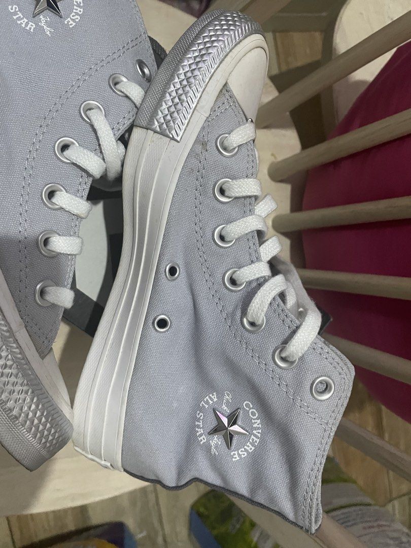 Converse All Star CTAS HI Grey Sneakers (Category: Sneakers) located in Manila. Submitted by boredninja (Listing ID 1422747656, Image 3). Description: - Converse All Star high-top sneakers - Color: Grey with silver toe cap and accents - Features white laces and Converse logo - Size: US 5, UK 3, EUR 35 - Includes original box - Made in Vietnam -Delivery arrangements and costs will be handled by the customer through their chosen courier..