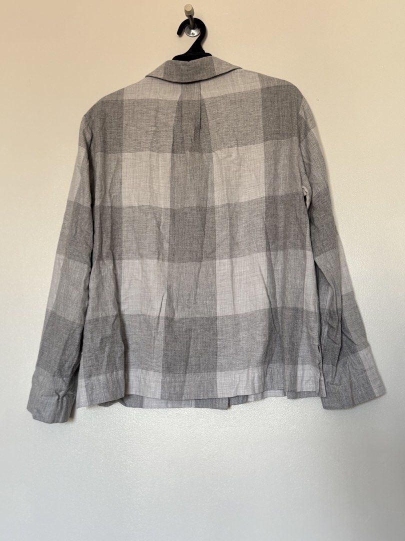 COS grey polo (Category: Longsleeves) located in Makati City. Submitted by pattystuff (Listing ID 1422762630, Image 2). Description: - Longsleeved polo with checked pattern - 100% cotton - M on tag but fits up to XL - With very small but unnoticeable hole - Needs washing - Pre-loved, please manage expectations.