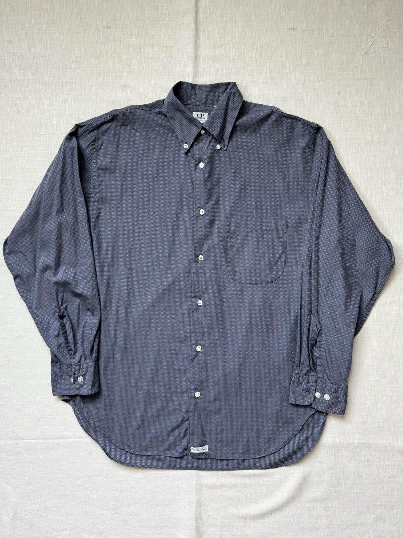 CP Company Shirt (Category: Shirts) located in Singapore. Submitted by mangosteeeeen (Listing ID 1422830540, Image 1). Description: C.P. COMPANY DOT NAVY SHIRT DESIGNED BY MASSIMO OSTI, FOUNDER OF STONE ISLAND BEAUTIFUL STICHING WORK AROUND THE SHIRT SIZE 3 FITS A LARGE .