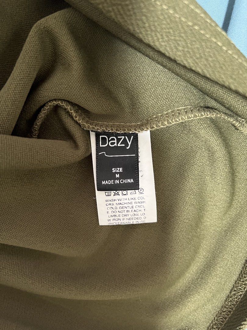 Dazy Olive Green Textured T-Shirt (Category: Tshirts & Polo Shirts ) located in Dasmarinas. Submitted by kelcastillo (Listing ID 1422753627, Image 3). Description: - Dazy olive green t-shirt - Size: M - Features: Crew neck, short sleeves - Fabric: Textured - Origin: Made in China - Style: Casual.