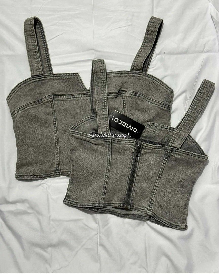 Divided Denim Top (Category: Sleeveless) located in Malabon City. Submitted by WanderThingsPH (Listing ID 1422834596, Image 2). Description: - Divided denim top - Square neckline - Adjustable straps - Back zipper closure - Grlay wash color - Durable denim fabric - Perfect for a casual chic look - Great with high-waisted bottoms.