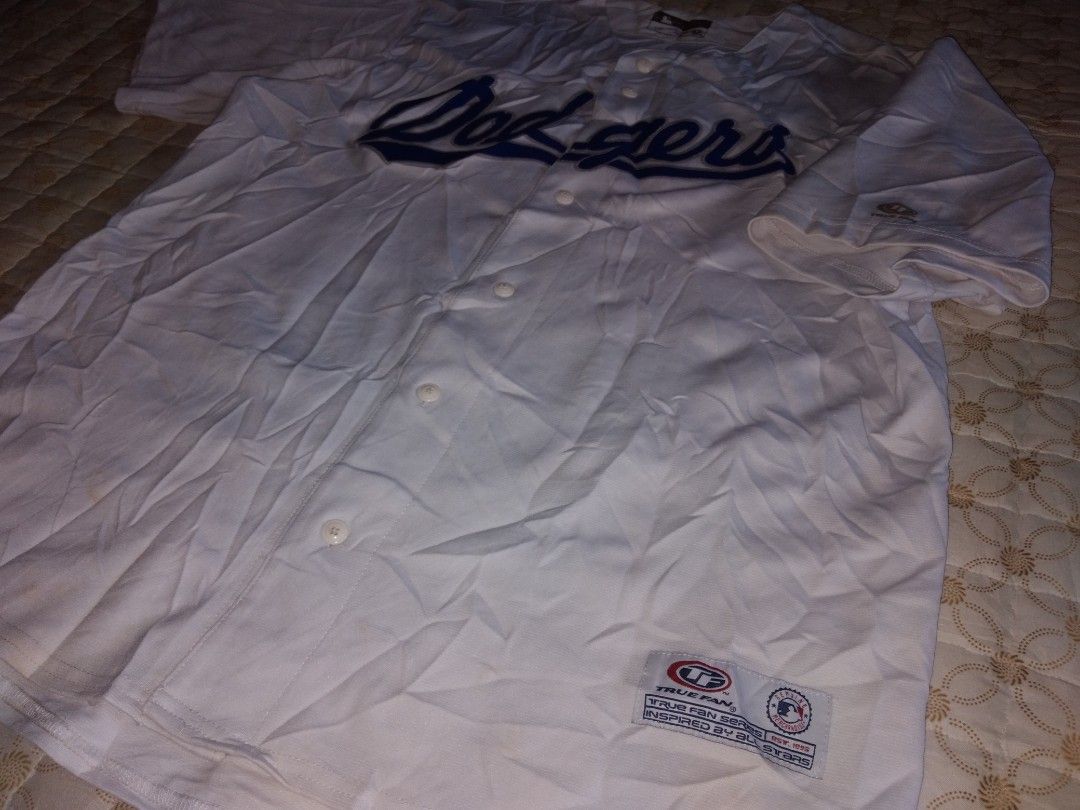 Dodgers Baseball Jersey large-xl (Category: Tshirts & Polo Shirts ) located in Zamboanga. Submitted by zhumhazhav (Listing ID 1422753410, Image 3). Description: - Dodgers baseball jersey - Size lare on tag - Features: Blue team name across the chest - Design: Button-up front, short sleeves - Brand: True Fan Series, inspired by All Stars - Origin: Made in China - Condition good to excellent - Color rate 9.5/10 - See all photos for details 850+ship