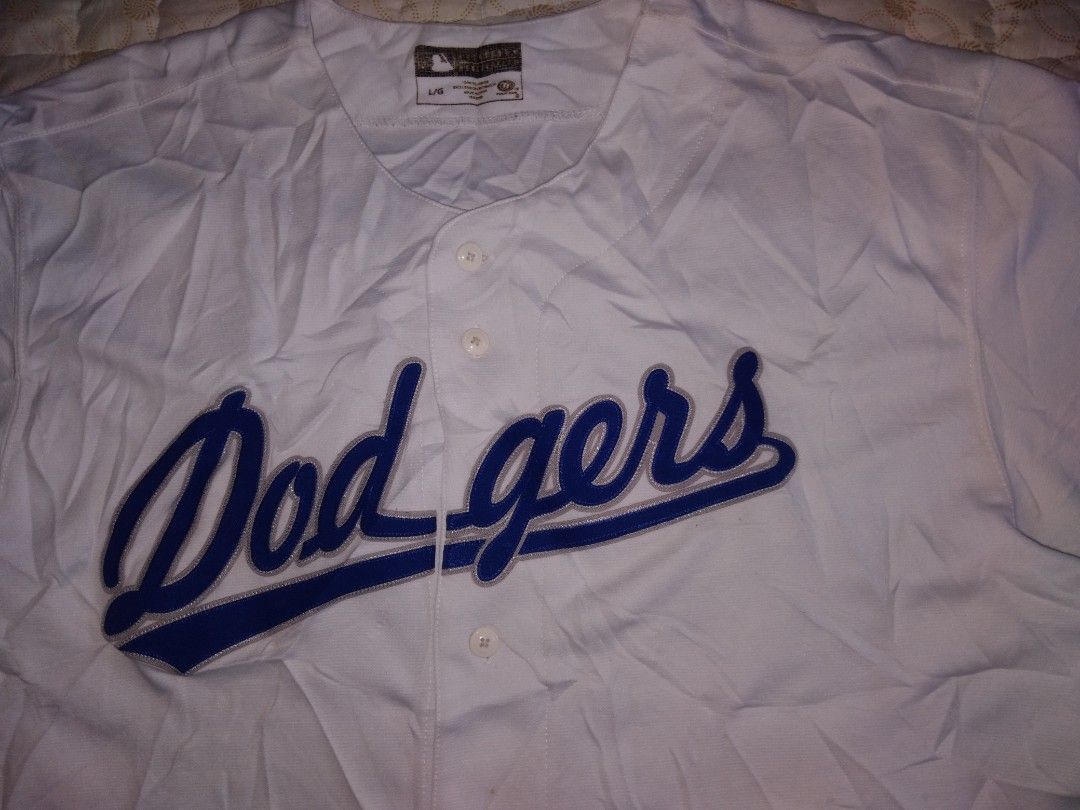 Dodgers Baseball Jersey large-xl (Category: Tshirts & Polo Shirts ) located in Zamboanga. Submitted by zhumhazhav (Listing ID 1422753410, Image 2). Description: - Dodgers baseball jersey - Size lare on tag - Features: Blue team name across the chest - Design: Button-up front, short sleeves - Brand: True Fan Series, inspired by All Stars - Origin: Made in China - Condition good to excellent - Color rate 9.5/10 - See all photos for details 850+ship