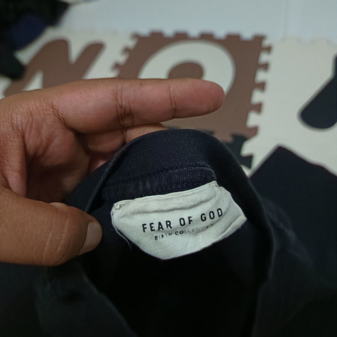 Fear of God FG Tee (Category: Tshirts & Polo Shirts ) located in Santa Cruz. Submitted by fiercegem_1ef7ea (Listing ID 1422885016, Image 2). Description: - Fear of God T-shirt - Black color - Features "FG" logo on front - Crew neck style - Authentic Fear of God label - Made in the USA - Standard fit.