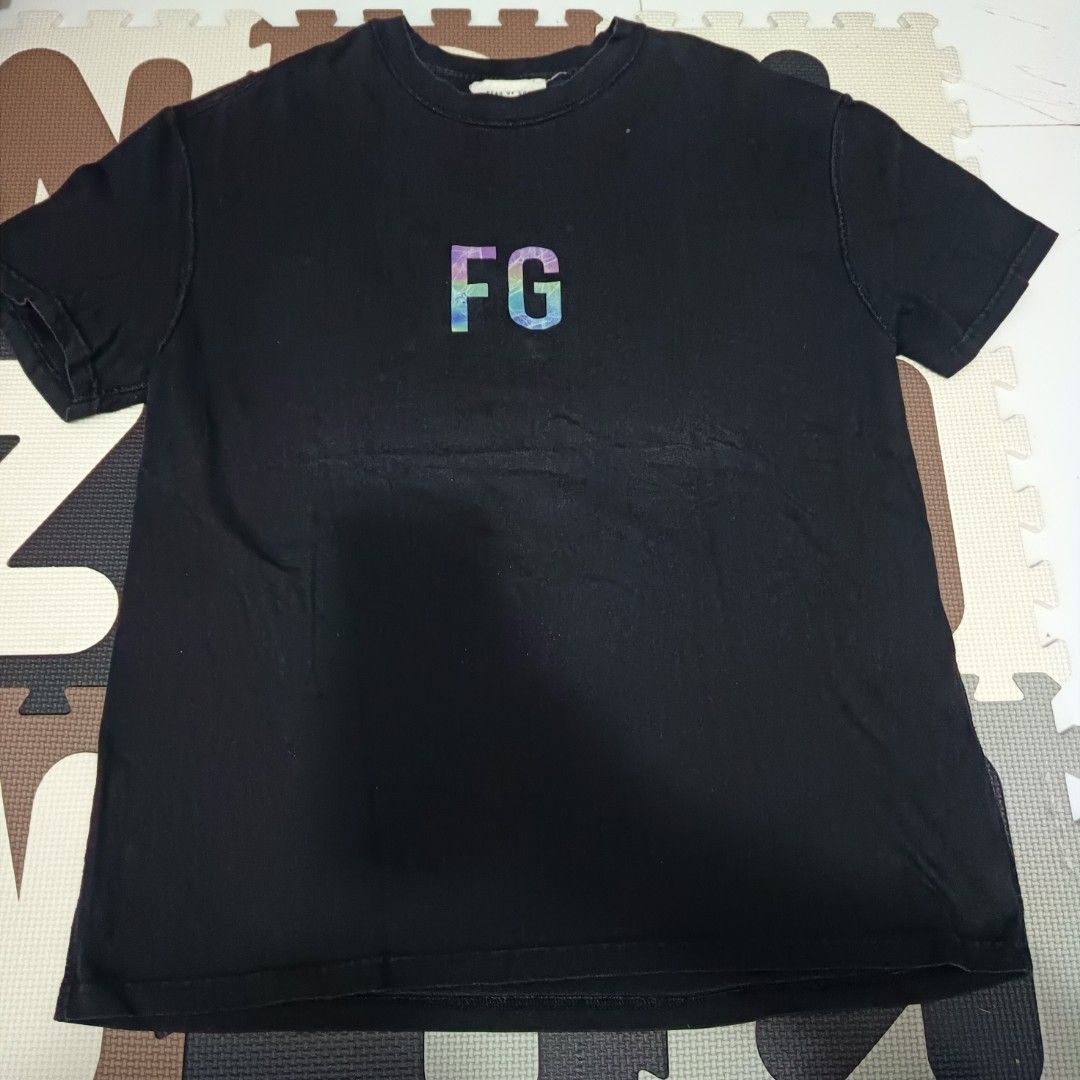 Fear of God FG Tee (Category: Tshirts & Polo Shirts ) located in Santa Cruz. Submitted by fiercegem_1ef7ea (Listing ID 1422885016, Image 1). Description: - Fear of God T-shirt - Black color - Features "FG" logo on front - Crew neck style - Authentic Fear of God label - Made in the USA - Standard fit.