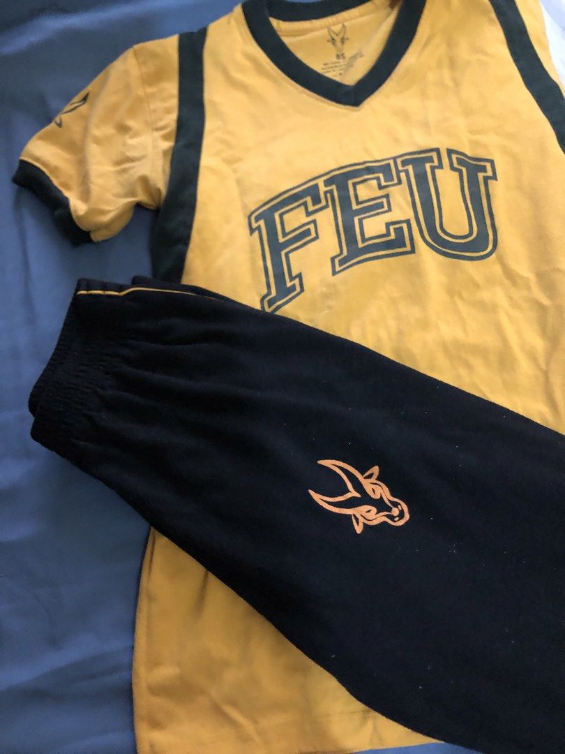 FEU Shirt and Pants Set (WRP Uniform) (Category: Sets or Coordinates) located in Manila. Submitted by gandariamarie (Listing ID 1422784509, Image 2). Description: - FEU shirt with green accents - Features FEU logo on front and sleeve - Includes black pants with elastic waistband - Pants have logo on the side - Ideal for casual wear or showing school spirit.