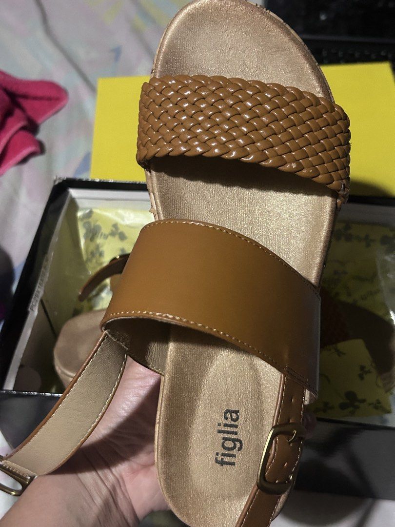 Figlia Pierce Tan Sandals Size 36 (Category: Flats & Sandals) located in Manila. Submitted by emsmerize (Listing ID 1422851356, Image 2). Description: - Figlia Pierce sandals - Tan color - Size 36 - Woven strap design - Cork wedge heel - Includes original box - Selling Price: 500PHP (Original Price: 1499 PHP) Used once same as new.