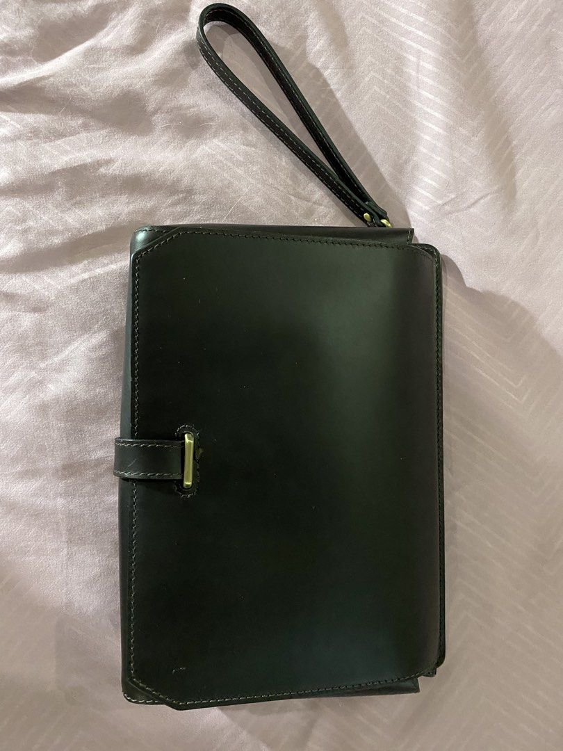Fino Clutch Bag (Category: Luxury Bags & Wallets) located in Manila. Submitted by lauro.catibayan (Listing ID 1422821382, Image 2). Description: Fino black leather clutch bag. 10 inches width, 7 inches height. Like new .