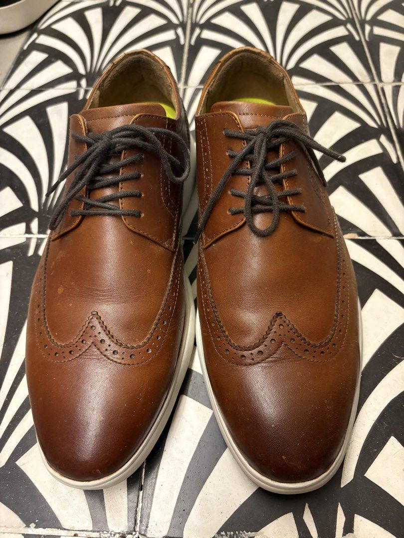 Florsheim Dash Wingtip Oxford Sneakers (Category: Dress Shoes) located in Makati City. Submitted by harekrisha (Listing ID 1422883895, Image 3). Description: These are my husband’s Florsheim Dash Wingtip Oxford sneakers in brown, combining a traditional brogued leather upper with a lightweight athletic sole for a polished yet comfortable look. Purchased from Amazon and originally paid 8,600 plus shipping..