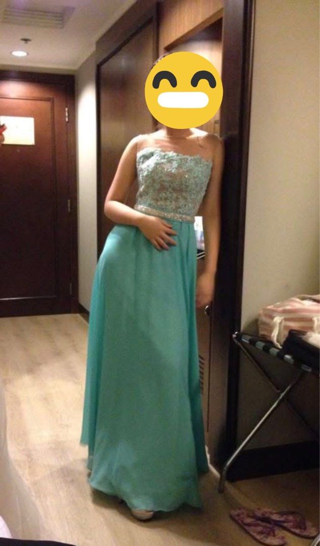 Mint Green Lace Embellished Gown (Category: Evening dresses & gowns) located in San Pedro. Submitted by mighty_oh (Listing ID 1422770333, Image 3). Description: Elegant mint green gown with intricate lace detailing. Features a sheer neckline and back with delicate beadwork. The bodice is embellished with lace and pearls, and the dress has a flowing, floor-length skirt. Perfect for formal events or special occasions. The dress has a fitted bodice 