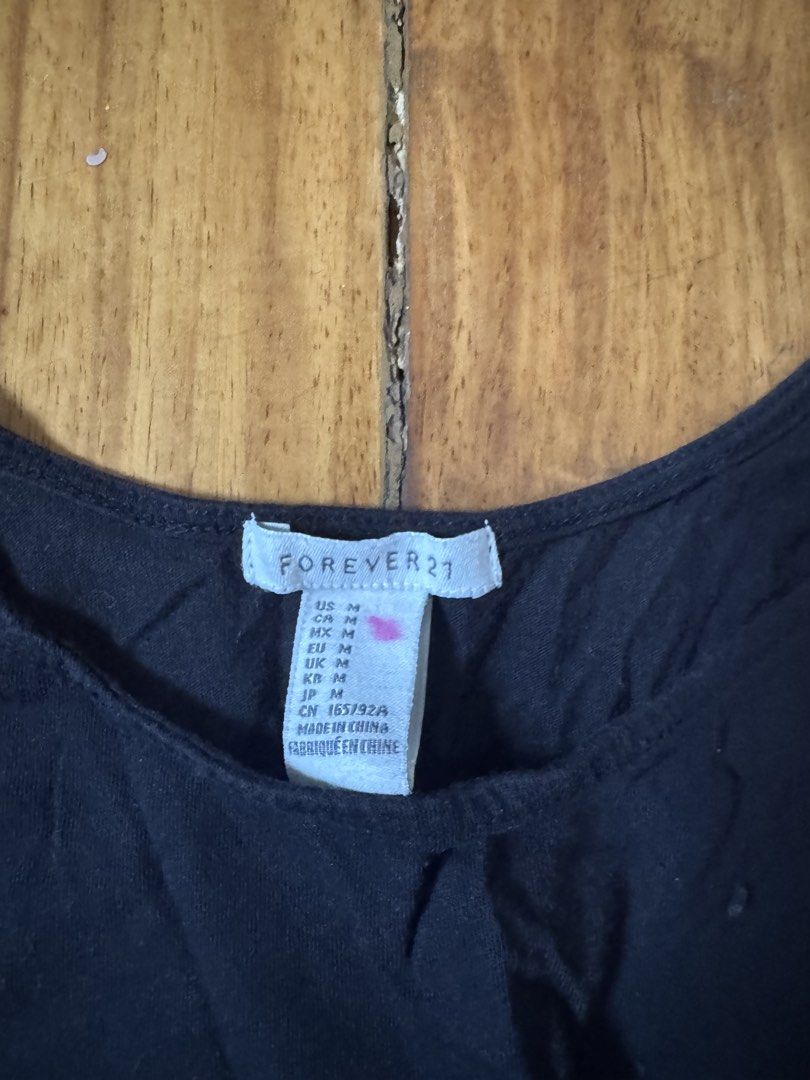 Forever 21 Black Casual Tank Top (Category: Sleeveless) located in Quezon City. Submitted by mp_declutters (Listing ID 1422778001, Image 2). Description: Best fits small to medium.