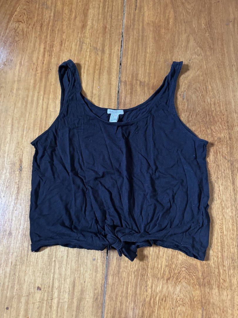 Forever 21 Black Casual Tank Top (Category: Sleeveless) located in Quezon City. Submitted by mp_declutters (Listing ID 1422778001, Image 1). Description: Best fits small to medium.