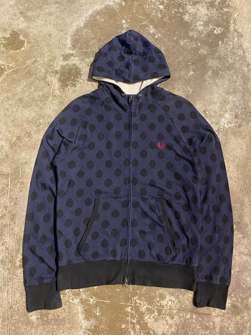 Fred Perry Polka Dots Zip Up Hoodie Jacket (Category: Hoodies) located in Cavite. Submitted by loadeadgears (Listing ID 1422773796, Image 1). Description: Fred Perry Polka Dots Zip Up Hoodie Jacket Size: Medium Dimes: W20 L26.5 SL24 Excellent condition Issue missing hood lace - Navy blue Fred Perry hoodie - Black polka dot design - Full zip closure - Two front pockets - Cream-colored hood interior - Embroidered Fred Perry logo - Made in Japan - S