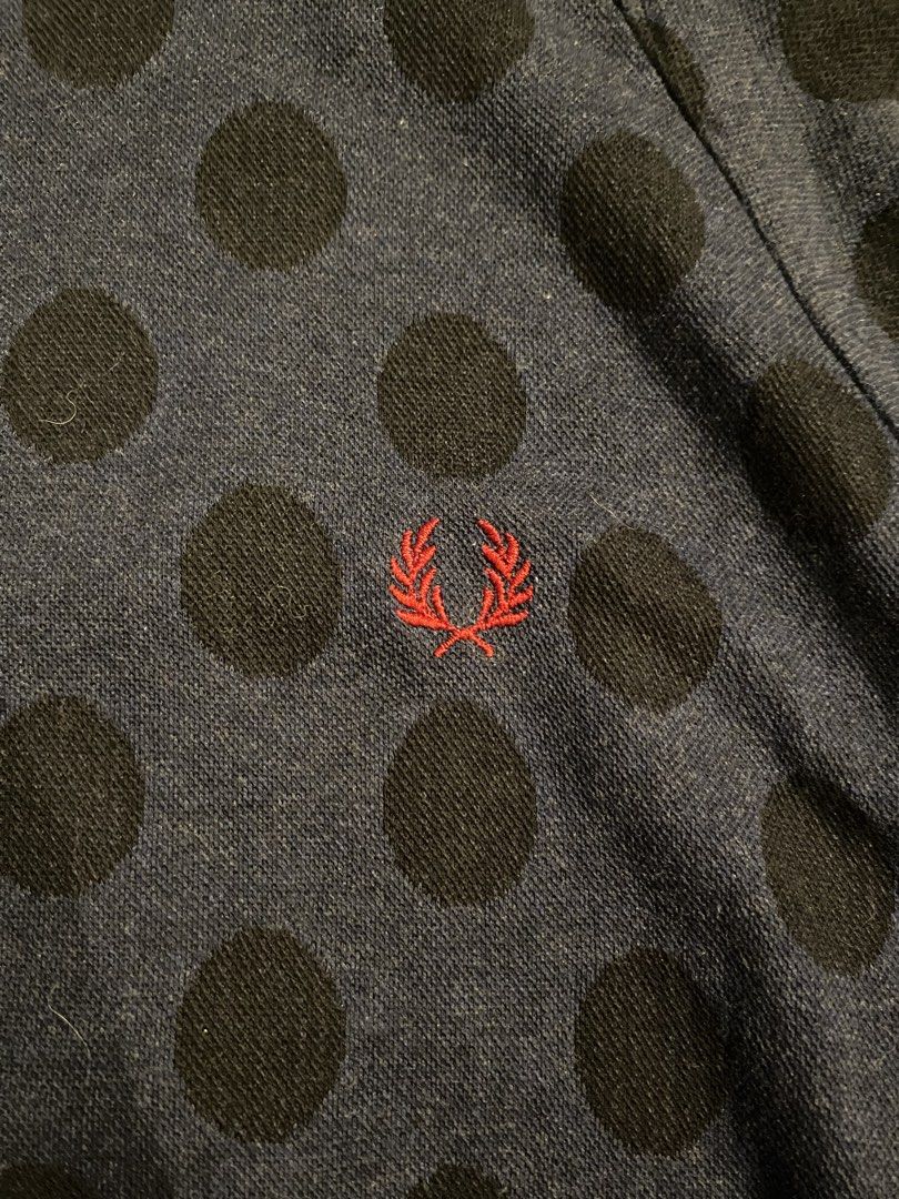 Fred Perry Polka Dots Zip Up Hoodie Jacket (Category: Hoodies) located in Cavite. Submitted by loadeadgears (Listing ID 1422773796, Image 3). Description: Fred Perry Polka Dots Zip Up Hoodie Jacket Size: Medium Dimes: W20 L26.5 SL24 Excellent condition Issue missing hood lace - Navy blue Fred Perry hoodie - Black polka dot design - Full zip closure - Two front pockets - Cream-colored hood interior - Embroidered Fred Perry logo - Made in Japan - S