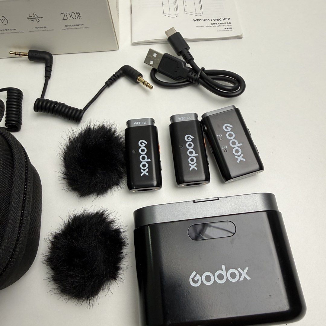 Godox WEC Kit2 Wireless Lavalier Microphone System (Category: Microphones) located in Quezon City. Submitted by jerreyess (Listing ID 1422867434, Image 2). Description: Godox WEC Kit2 Wireless Lavalier Microphone System Inclusions: - Receiver - 2 transmitters - 2 Furry windscreen - Charging case - 3.5mm TRS-TRRS Audio Cable - 3.5mm TRS-TRS Audio Cable - USB-A to USB-C Data Cable - Storage Box CONDITION: Like new. Minimal signs of use. MOP: GCash,