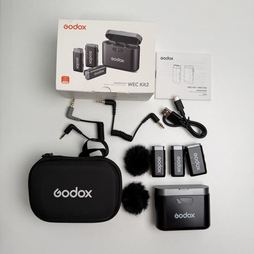 Godox WEC Kit2 Wireless Lavalier Microphone System (Category: Microphones) located in Quezon City. Submitted by jerreyess (Listing ID 1422867434, Image 1). Description: Godox WEC Kit2 Wireless Lavalier Microphone System Inclusions: - Receiver - 2 transmitters - 2 Furry windscreen - Charging case - 3.5mm TRS-TRRS Audio Cable - 3.5mm TRS-TRS Audio Cable - USB-A to USB-C Data Cable - Storage Box CONDITION: Like new. Minimal signs of use. MOP: GCash,