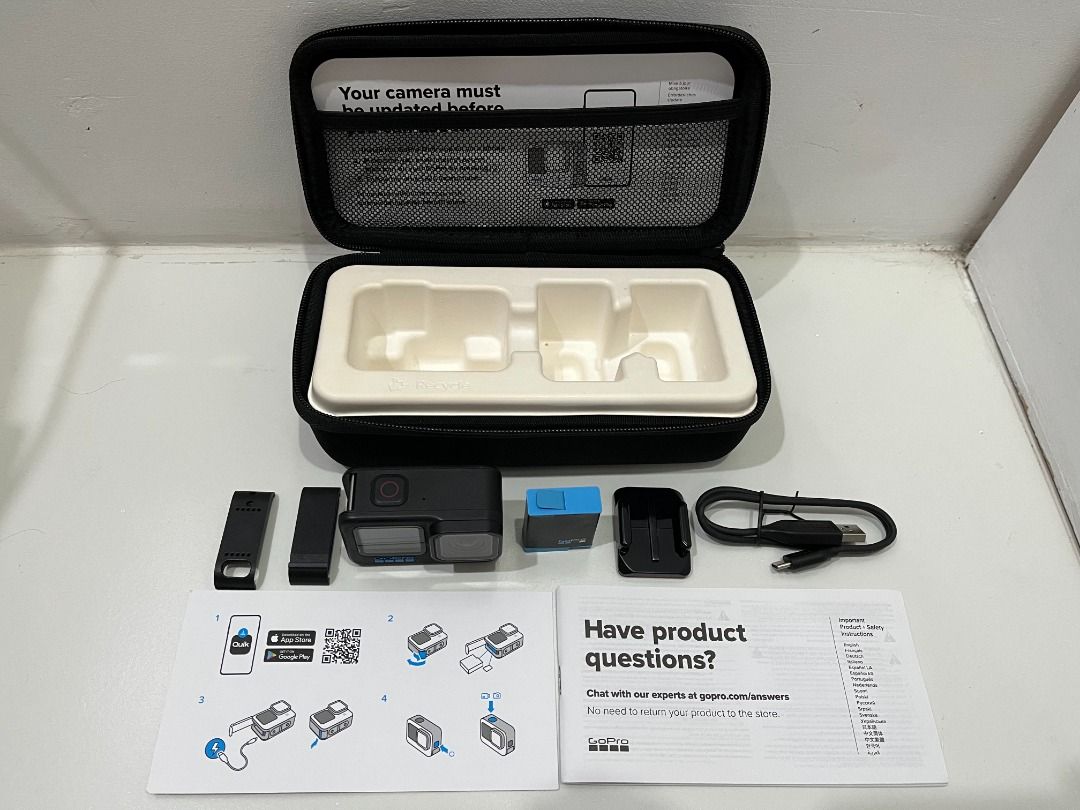 GoPro Hero 10 Black (Category: Video Cameras) located in Quezon City. Submitted by papabey (Listing ID 1422755942, Image 3). Description: -Used but still in very good condition (see pictures) -Screen protectors on front and back screens plus camera lens -Original Battery Door Cover is included (unused) -Extra Ulanzi Battery Door Cover with USB-C Pass-through -Includes original battery, hard case, mount with 3M tape, USB-A to USB-C Cable and vario