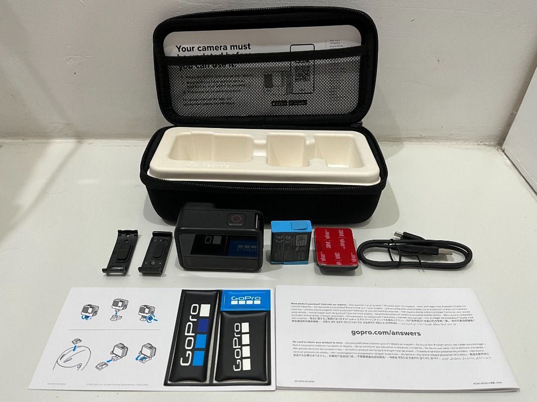 GoPro Hero 10 Black (Category: Video Cameras) located in Quezon City. Submitted by papabey (Listing ID 1422755942, Image 2). Description: -Used but still in very good condition (see pictures) -Screen protectors on front and back screens plus camera lens -Original Battery Door Cover is included (unused) -Extra Ulanzi Battery Door Cover with USB-C Pass-through -Includes original battery, hard case, mount with 3M tape, USB-A to USB-C Cable and vario