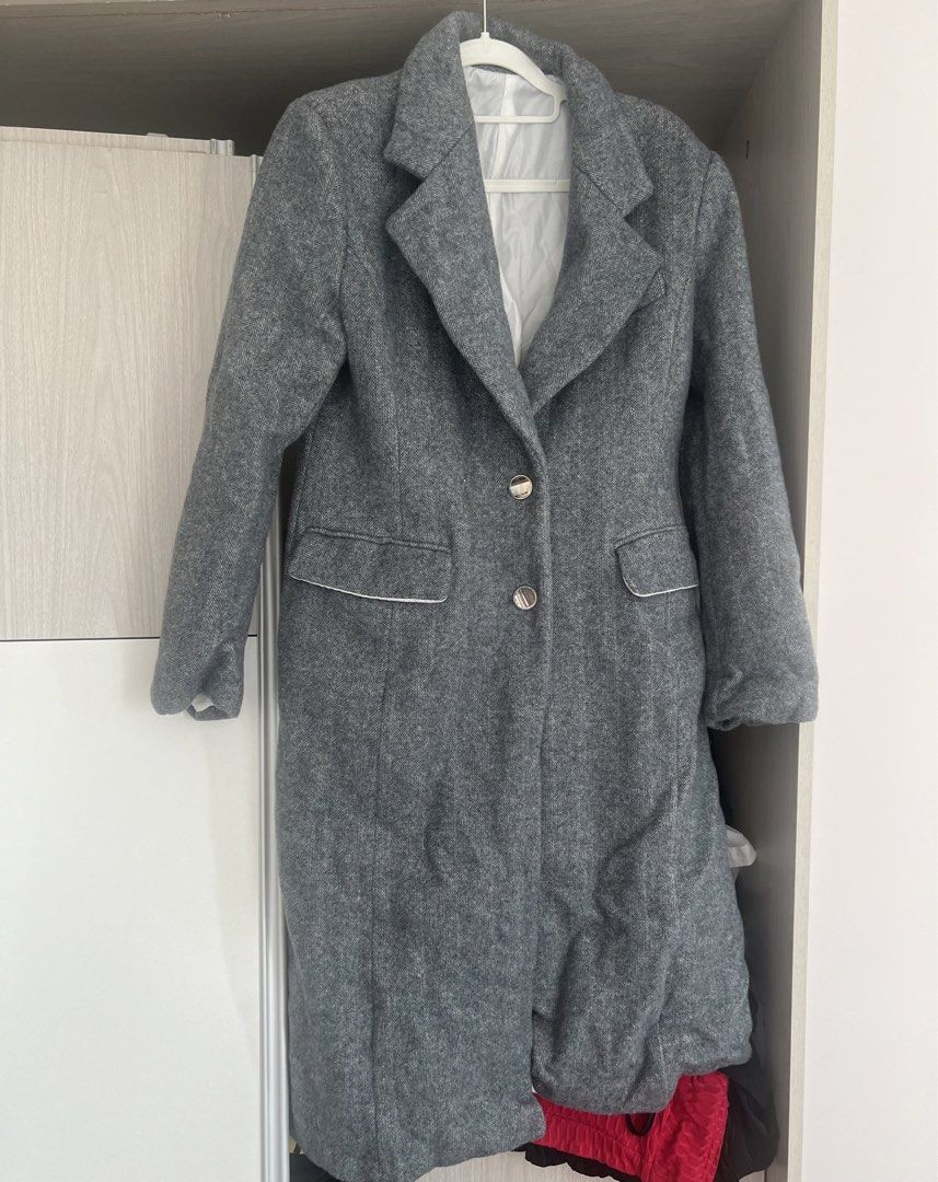 Gray Long Coat (Category: Coats, Jackets and Outerwear) located in Makati City. Submitted by warm.abc123 (Listing ID 1422767427, Image 2). Description: Long coat wool blend tweed - Classic gray coat - Button closure - Tailored fit - Soft fabric (possibly wool-blend) - Lapel collar - Long sleeves - Suitable for cooler weather - Versatile for various outfits.