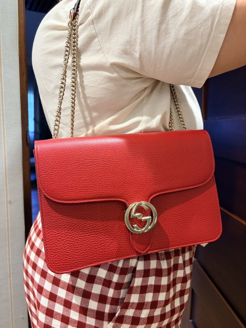 Gucci Red Leather Shoulder Bag (Category: Luxury Bags & Wallets) located in Caloocan City. Submitted by fiercestone-c8e70e (Listing ID 1422815035, Image 2). Description: selling low - no card, no dustbag, no receipt - Authentic Gucci shoulder bag - Vibrant red leather - interlocking G logo - Chain strap - Flap closure - Textured leather finish - Medium size.