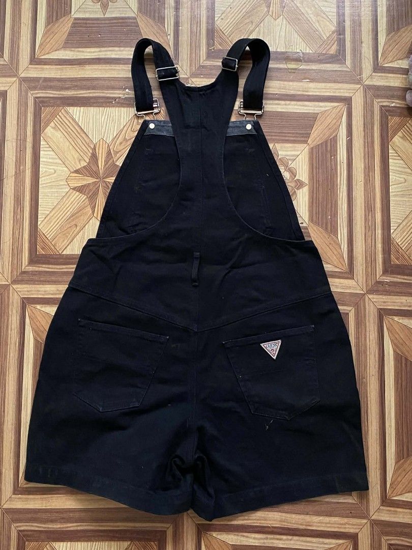 Guess Jeans Black Overalls Shorts (Category: Jumpsuits) located in Manila. Submitted by amari3270 (Listing ID 1422750079, Image 3). Description: - Guess Jeans overalls shorts - Adjustable straps - Button closures on sides - Front and back pockets - Guess Jeans logo on back pocket - Made in Mexico.
