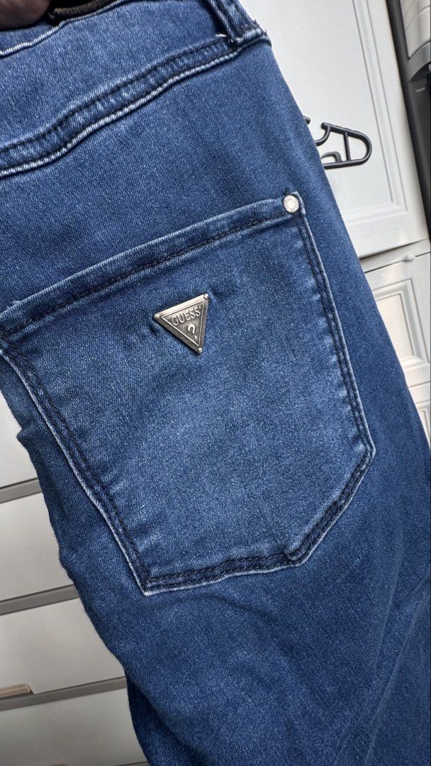Guess Super Skinny Jeans (Category: Jeans) located in Pasig City. Submitted by cyebem (Listing ID 1422780186, Image 3). Description: - Dark wash Guess jeans - Super skinny fit - High-waisted - Features Guess logo on back pocket - Classic five-pocket design - Zip fly and button closure.
