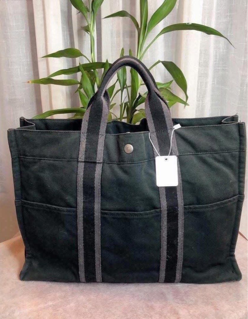 Hermes Canvas Herline PM tote bag Medium Size (Category: Luxury Bags & Wallets) located in Muntinlupa City. Submitted by bff_findsph (Listing ID 1422803791, Image 1). Description: Canvas Herline PM Tote Bag Guaranteed Authentic Medium size Made of durable canvas Color remains vibrant – not faded Clean corners – no rubs Well-maintained and in excellent condition Can fit Laptop and documents Color may slightly vary due to lighting and screen settin