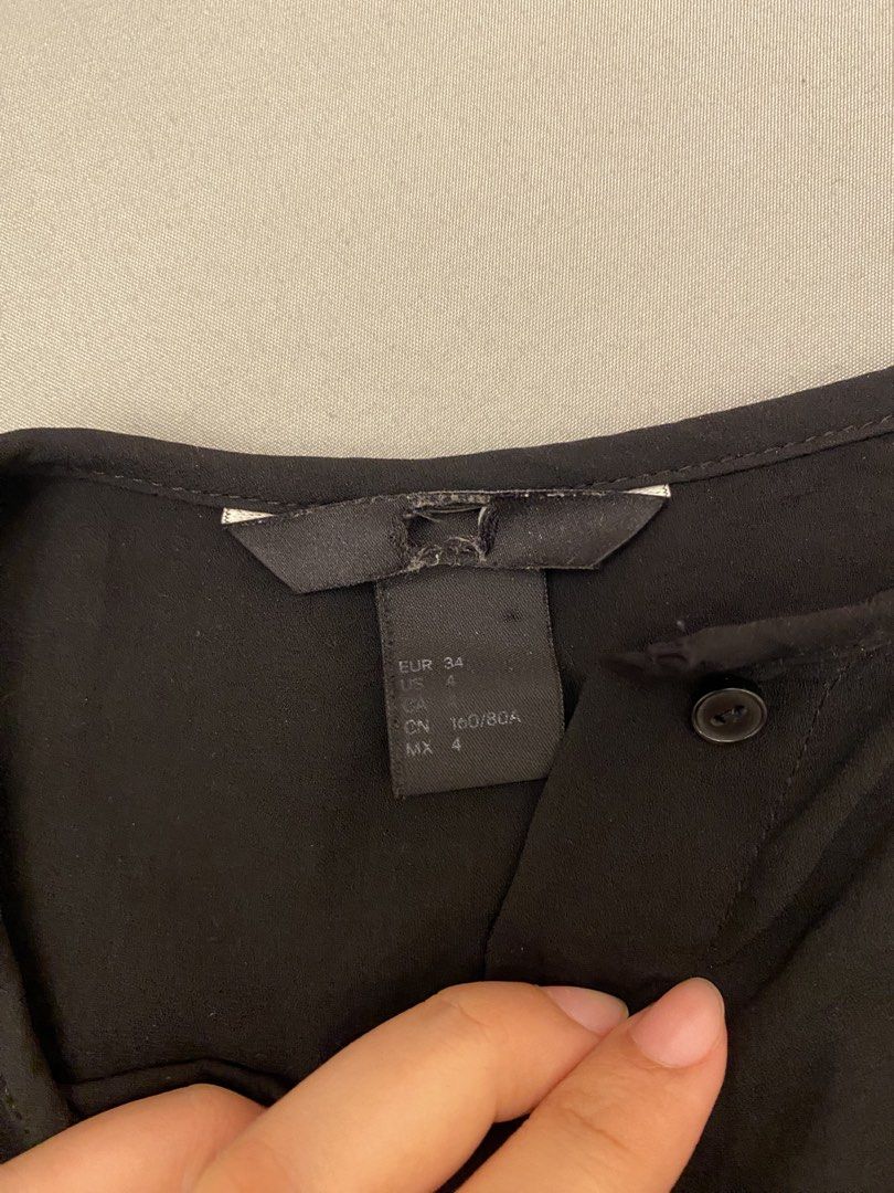 H&M Black Blouse Size EUR 34 (Category: Blouses) located in Mandaluyong City. Submitted by weakassbitch (Listing ID 1422817905, Image 2). Description: - H&M black blouse - Button-down front - Two front pockets - Long sleeves with buttoned cuffs - Round neckline - Size: EUR 34, US 4, CN 160/80A, MX 4.