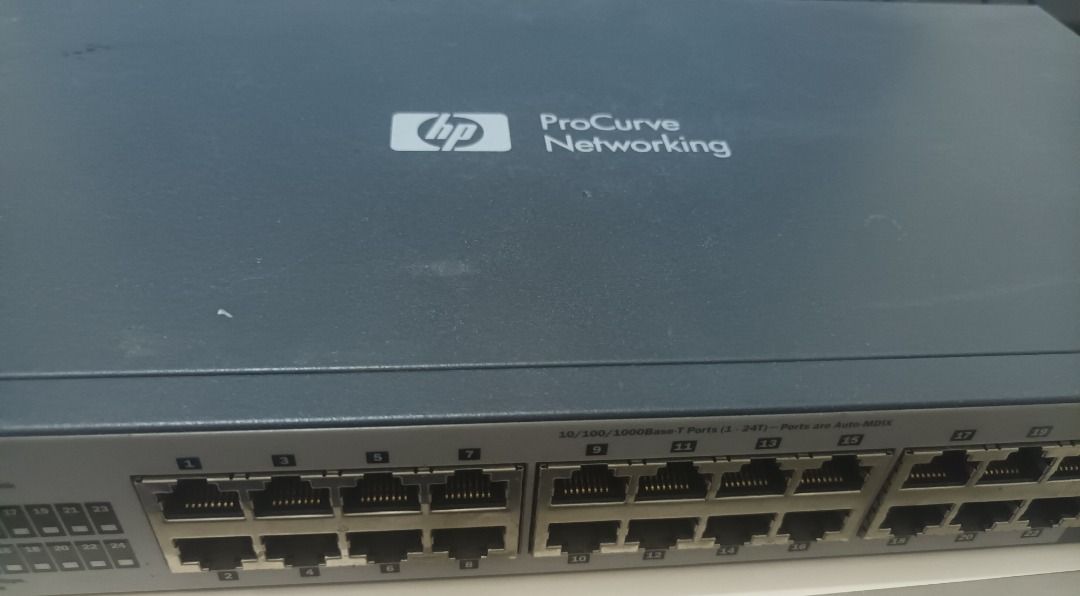 HP ProCurve 1400-24G Switch (Category: Nintendo) located in Manila. Submitted by ipstuff23 (Listing ID 1422844085, Image 2). Description: - HP ProCurve 1400-24G switch - 24 ports - Dual personality ports - Supports 10/100/1000Base-T and SFP - Ports labeled 1-24 - Power and link/activity indicators for each port - Made in China.