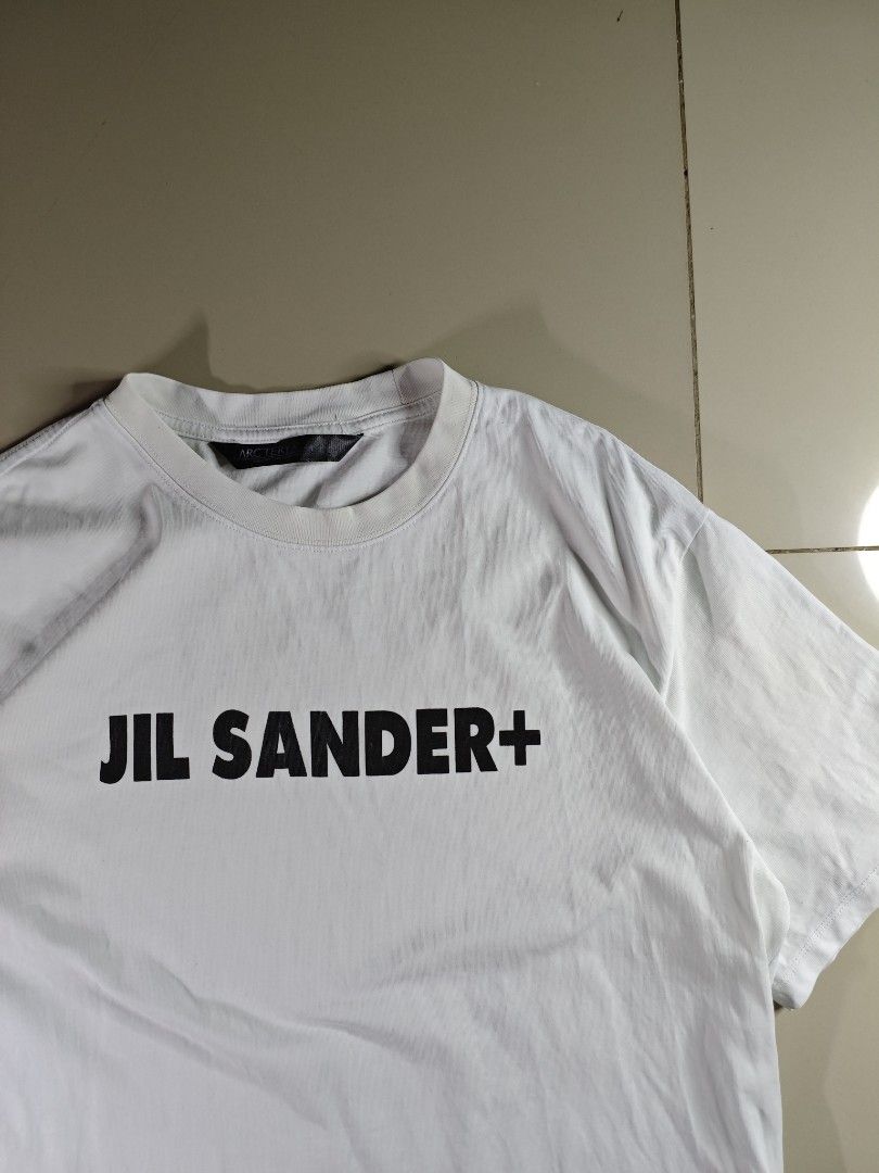 Jil Sander x Arc'teryx Big Headless Bird Logo Tee (Category: Tshirts & Polo Shirts ) located in San Pedro. Submitted by chronothrift (Listing ID 1422876264, Image 3). Description: - Size: XL Best Fit - Condition: 9.3/10 - Color Rate: 9/10 - Flaws: NONE MOD: J&T Express / Lalamove / Meet MOP: Gcash / Bank Transfer.
