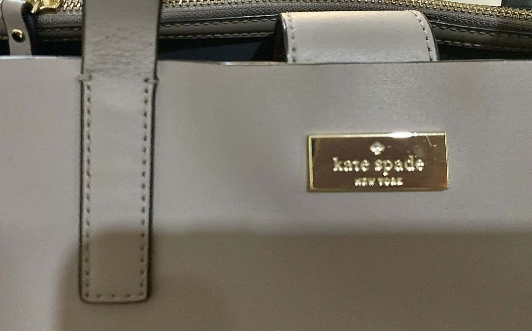 Kate Spade Cameron Street Medium Satchel (Category: Shoulder Bags) located in Paranaque City. Submitted by gavinledesma (Listing ID 1422882596, Image 3). Description: Kate Spade Cameron Street Medium Satchel -100% Genuine cow leather, structured saffiano leather with gold hardware -Taupe/greige neutral color -Dual top handles + long detachable shoulder strap -With shopping carton bag and green booklet -Very good pre-loved condition, clean, sturdy
