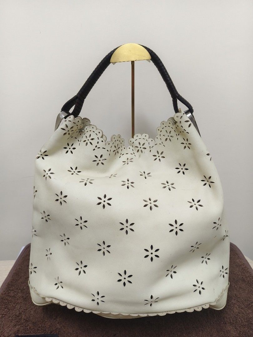 Kenzo Pagodon Leather Bag (Category: Luxury Bags & Wallets) located in Baguio. Submitted by PreiLoveMaria (Listing ID 1422791701, Image 2). Description: Kenzo Pagodon Leather Bag - a standout design known for its architectural, pagoda-inspired silhouette. A rare and eye-catching piece from Kenzo that blends edgy structure with everyday functionality. Material: Genuine Leather 📏 Measurements: • Width: 13 in • Height: 11.4 in • Depth: 7.5 in Condi