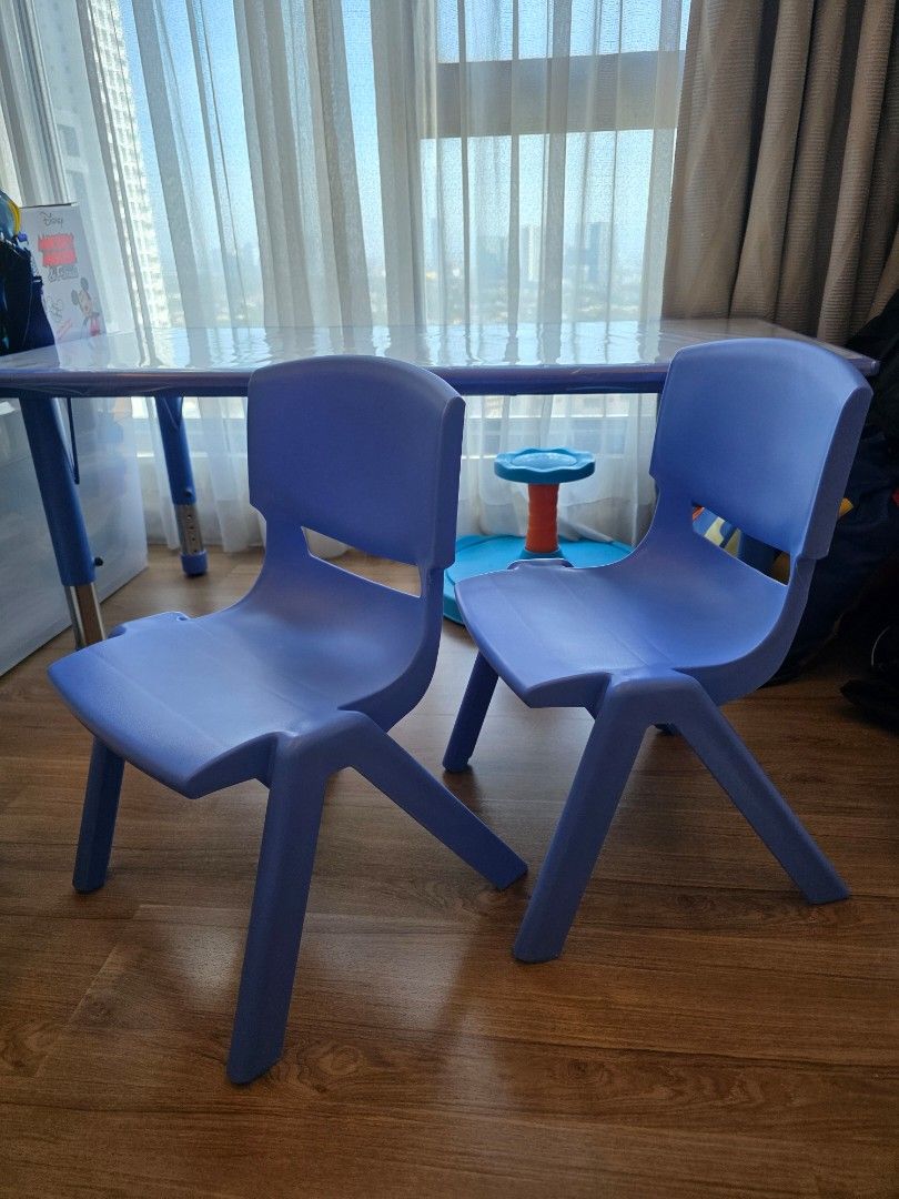 Kids Table and Chairs Set (Category: Kids Tables & Chairs) located in Pasig City. Submitted by pepperoo (Listing ID 1422720560, Image 2). Description: - Includes a rectangular table and two blue chairs. - Table features adjustable legs and a clear plastic cover. - Chairs are made of durable blue plastic. - Ideal for kids' activities, snacks, and playtime. - Sturdy and easy to clean. Bought from Raptor QC RFS: Decluttering SRP: Table - 4400, Chair