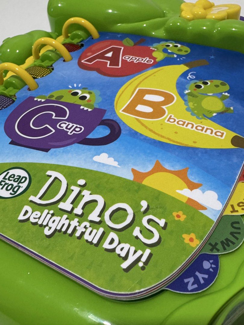 LeapFrog Dino's Delightful Day Interactive Book (Category: Children's Books) located in Manila. Submitted by karmarqz (Listing ID 1407484311, Image 3). Description: Barely used but has scratch and crayon marking on cover page; crayon marking on second page -- see photos. All buttons and pages (flip) are working perfectly. Used for less than a month. RFS Stocked, hindi ginagamit. Letters and words are woven into the story in alphabetical order wit