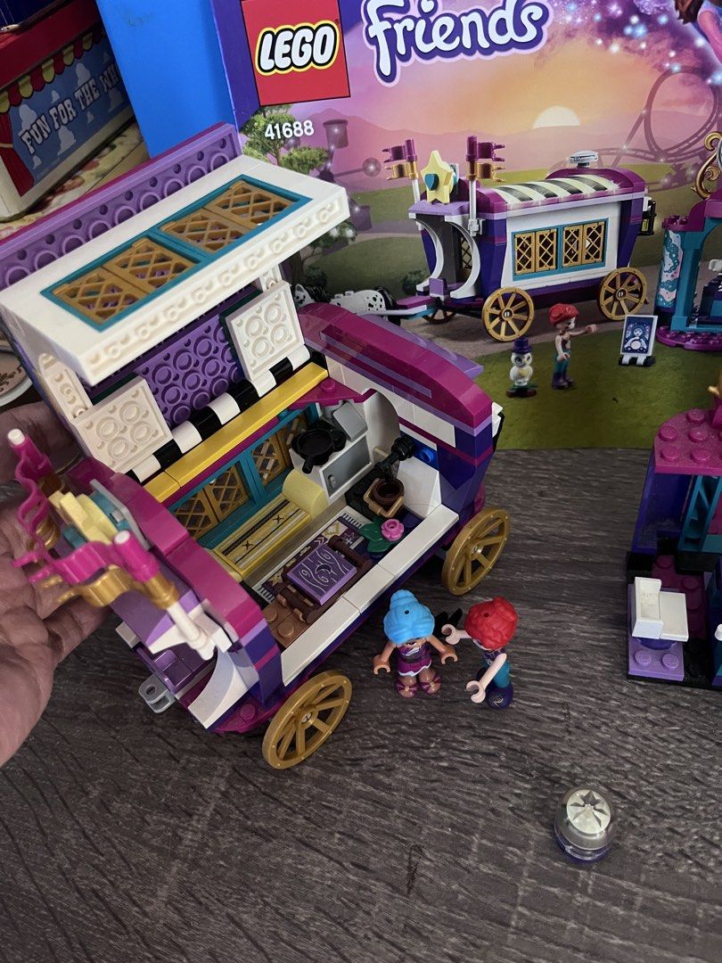 LEGO Friends Magical Caravan Set 41688 (Category: Lego & Building Sets) located in Cebu City. Submitted by abct1 (Listing ID 1422784975, Image 3). Description: - LEGO Friends Magical Caravan set. - Includes caravan, fortune-telling booth, and mini-figures. - Box included. - Features detailed interior and accessories. - Vibrant colors and intricate designs..