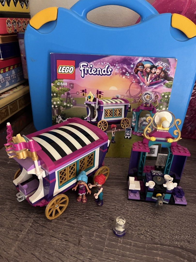 LEGO Friends Magical Caravan Set 41688 (Category: Lego & Building Sets) located in Cebu City. Submitted by abct1 (Listing ID 1422784975, Image 1). Description: - LEGO Friends Magical Caravan set. - Includes caravan, fortune-telling booth, and mini-figures. - Box included. - Features detailed interior and accessories. - Vibrant colors and intricate designs..