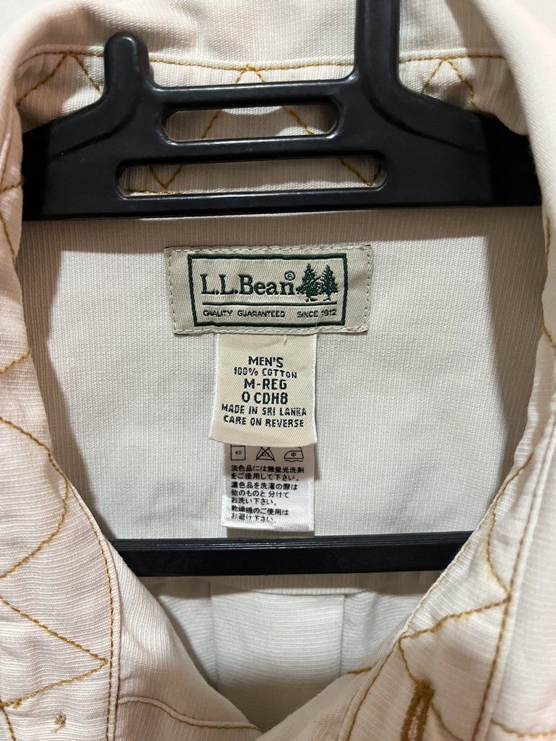 l.l.bean Double Pocket Utility Shirt (Category: Tshirts & Polo Shirts ) located in Bacolod City. Submitted by chrlsmlns (Listing ID 1422799634, Image 2). Description: HIGHLIGHTS: - L.L.Bean button-up shirt - Size: Best fit - Large (22x31) - Material: 100% cotton - Features: Two chest pockets, buttoned cuffs, with extra buttons - Color: Beige with contrasting stitching - Made in Sri Lanka.