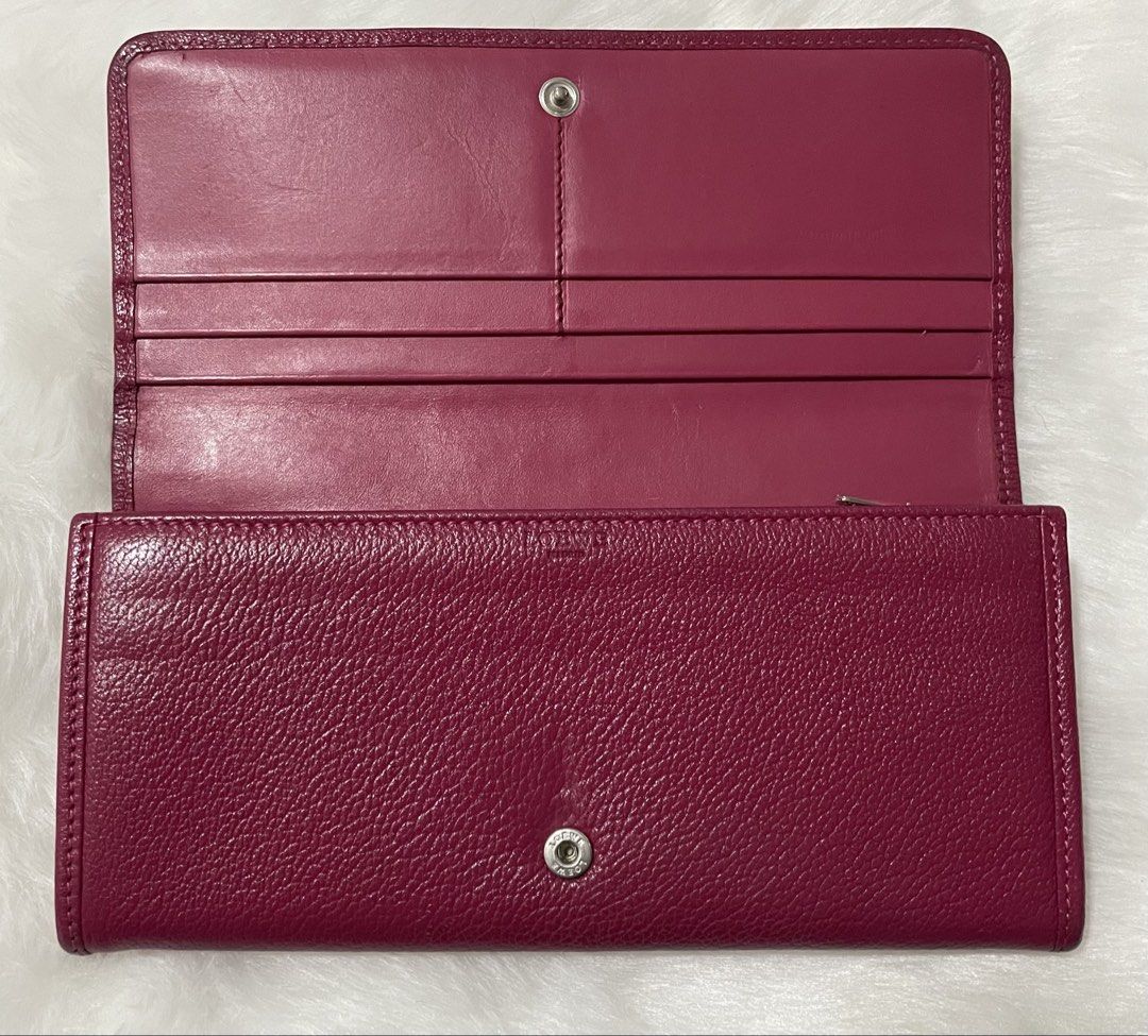 Loewe Bordeaux Leather Bifold Wallet (Category: Luxury Bags & Wallets) located in Quezon City. Submitted by pia1988 (Listing ID 1422779108, Image 3). Description: Loewe Bordeaux Leather Flap Bifold Wallet * made of leather material * button closure (main) & zipped closure (external & internal pockets) * padlock detail * multiple card slots * bill and coin compartments * embossed Loewe logo * measures 7.5” x 3.5” x 1” (7.5” x 7.5” when open) Prelo