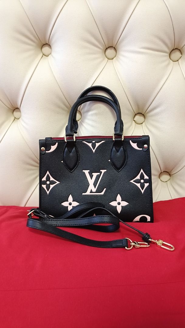 Louis Vuitton OnTheGo PM Black Pink (Category: Luxury Bags & Wallets) located in Cebu City. Submitted by erlacoleccion (Listing ID 1422760830, Image 1). Description: - Louis Vuitton OnTheGo PM handbag -Japan Surplus - Black exterior with pink monogram print - Two top handles - Detachable shoulder strap - Red interior lining - Gold-tone hardware - Stylish and versatile design.