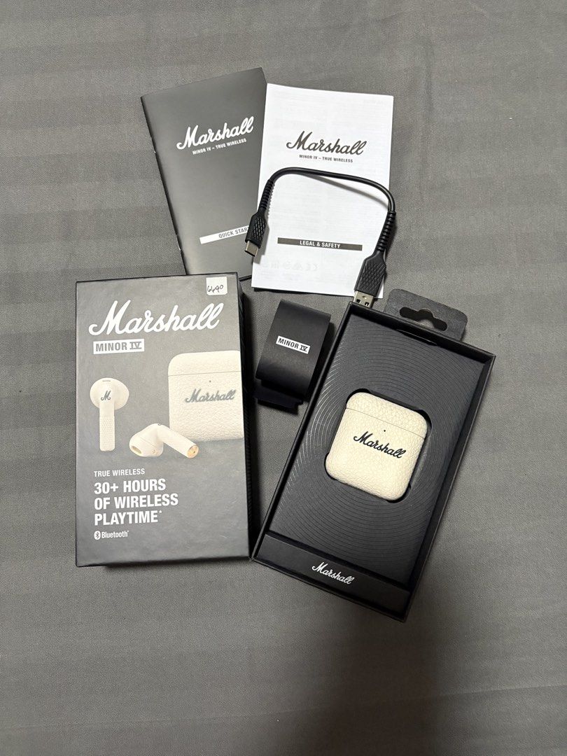 Marshall Minor IV Cream (Category: Earphones) located in Quezon City. Submitted by chxrryx (Listing ID 1422854484, Image 3). Description: - Brand: Marshall - Model: Minor IV - Color: Cream - Condition: Like New - Design: Stylish and sleek - Features: Great sound quality - Playtime: 30+ hours of wireless playtime - Includes: Earbuds, charging case, and charging cord - Bought last december but didn’t used much since I used my wired earphones most o