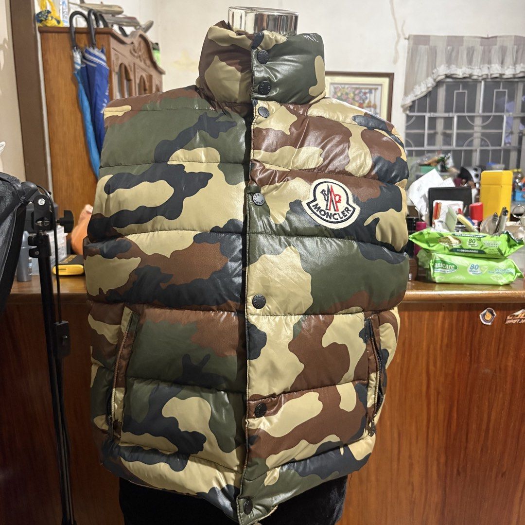 Moncler Camouflage Puffer Vest (Category: Luxury Apparel) located in Dinalupihan. Submitted by hell.thrift (Listing ID 1422864945, Image 3). Description: Size:1 Length:22 Width:22 No issue as new Puffiness 10/10 .