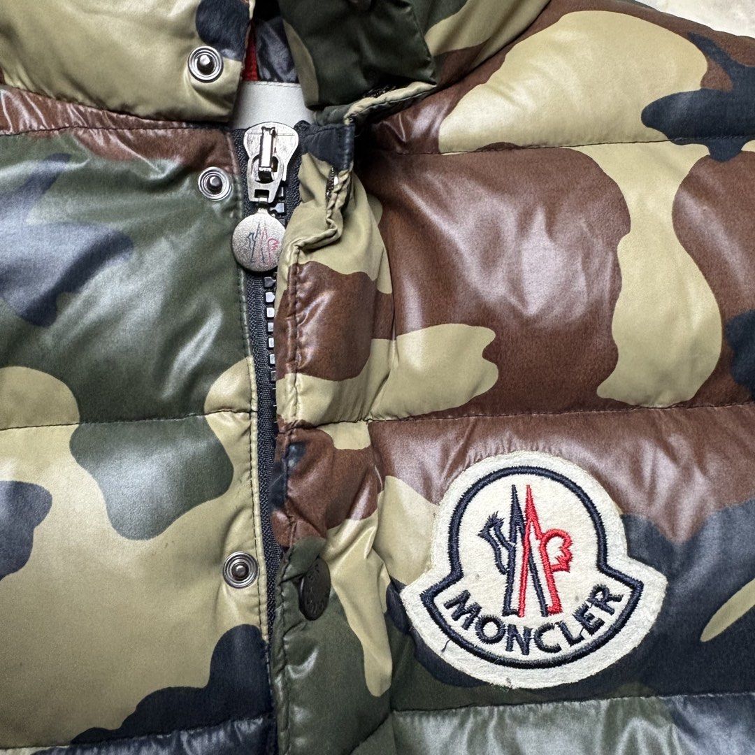 Moncler Camouflage Puffer Vest (Category: Luxury Apparel) located in Dinalupihan. Submitted by hell.thrift (Listing ID 1422864945, Image 2). Description: Size:1 Length:22 Width:22 No issue as new Puffiness 10/10 .